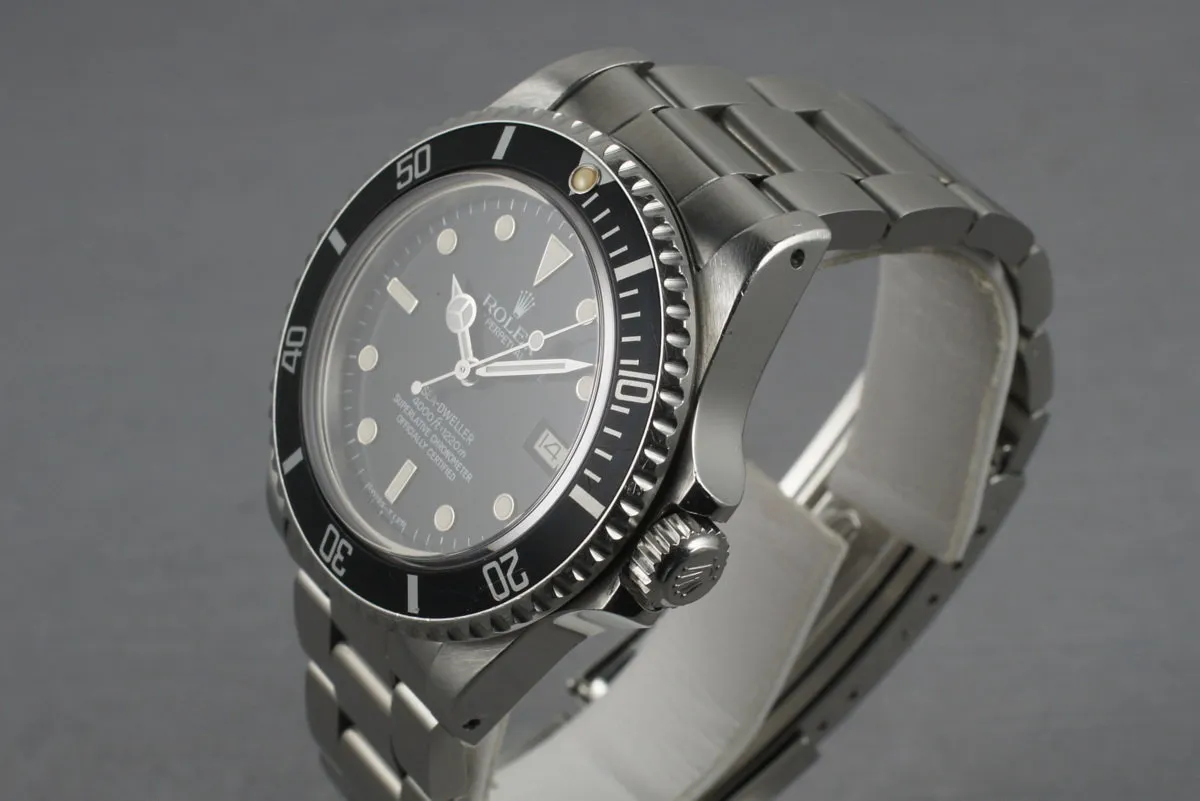 Rolex Sea Dweller 16660 with RSC service Papers