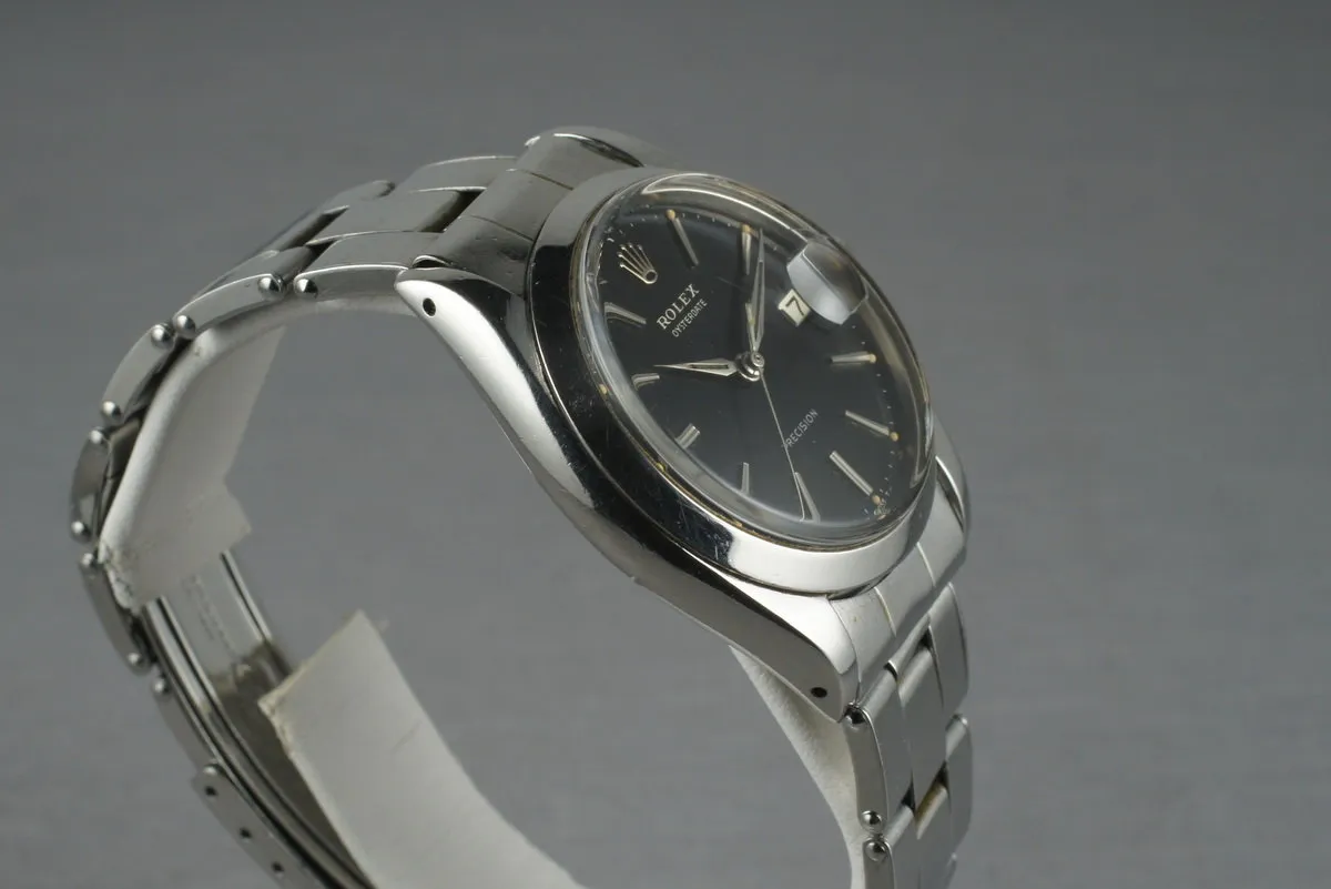 Rolex Steel Precision Oyster Date 6694 with gilt print