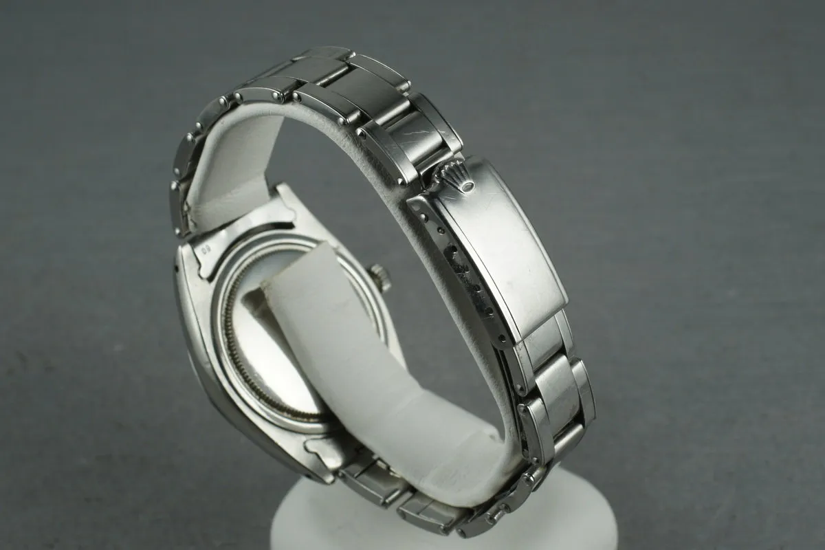 Rolex Steel Precision Oyster Date 6694 with gilt print