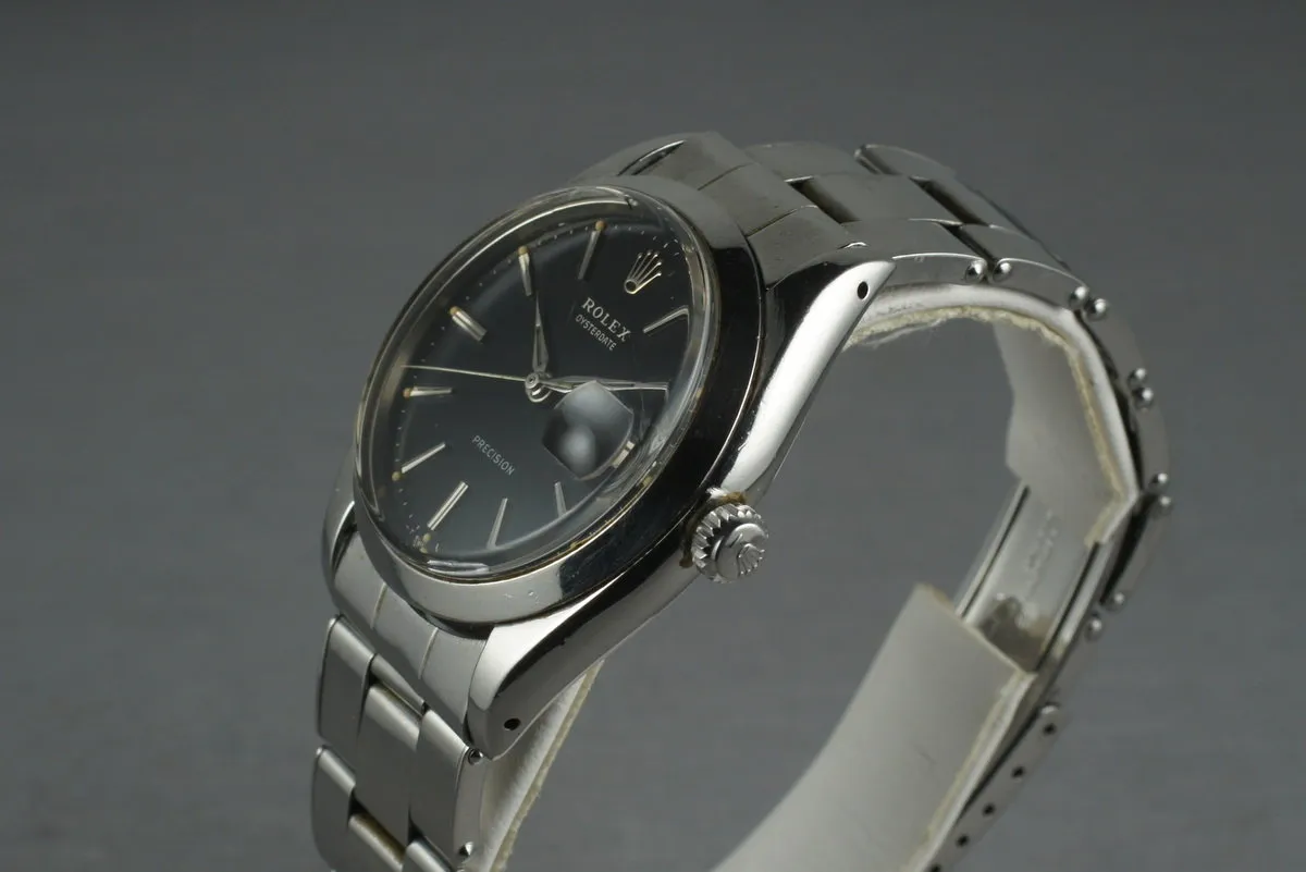 Rolex Steel Precision Oyster Date 6694 with gilt print