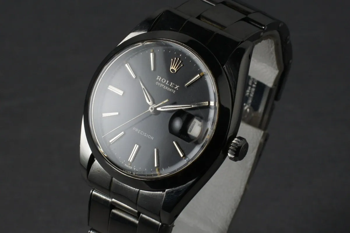 Rolex Steel Precision Oyster Date 6694 with gilt print
