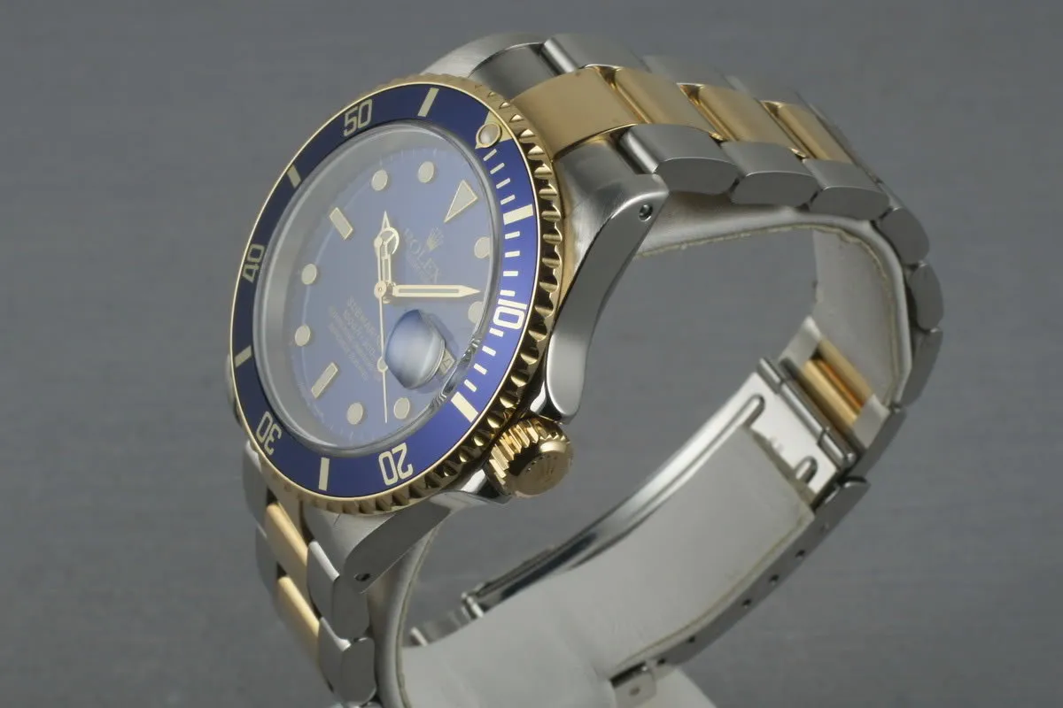 Rolex Submariner 18K/SS Blue Dial  16613 with Box and Papers