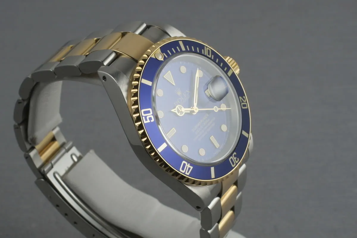 Rolex Submariner 18K/SS Blue Dial  16613 with Box and Papers