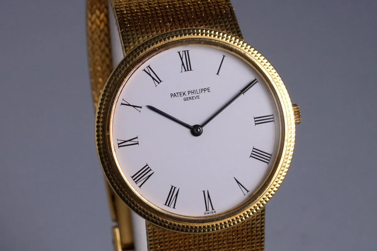 Vintage YG Patek Philippe Quartz 3954 with Box and Papers