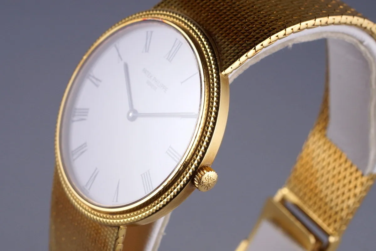 Vintage YG Patek Philippe Quartz 3954 with Box and Papers