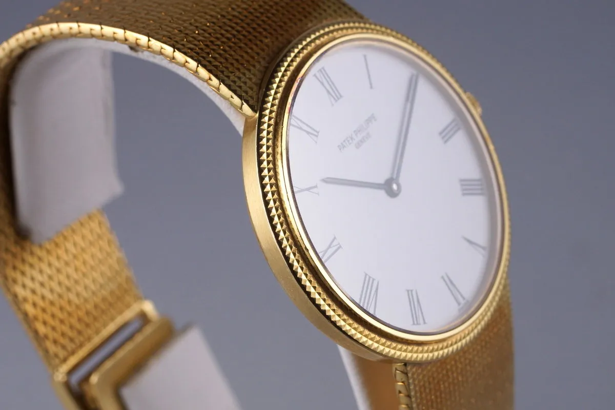 Vintage YG Patek Philippe Quartz 3954 with Box and Papers