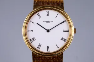 Vintage YG Patek Philippe Quartz 3954 with Box and Papers